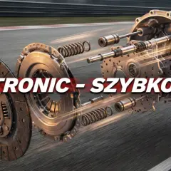 Rozłożony na części S-TRONIC, symbol szybkości i precyzji, na tle toru wyścigowego.