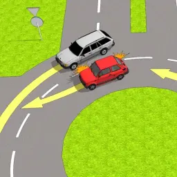 Kolizja na rondzie! Czerwony samochód nie ustąpił pierwszeństwa, wjeżdżając na rondo przed srebrnym kombi.